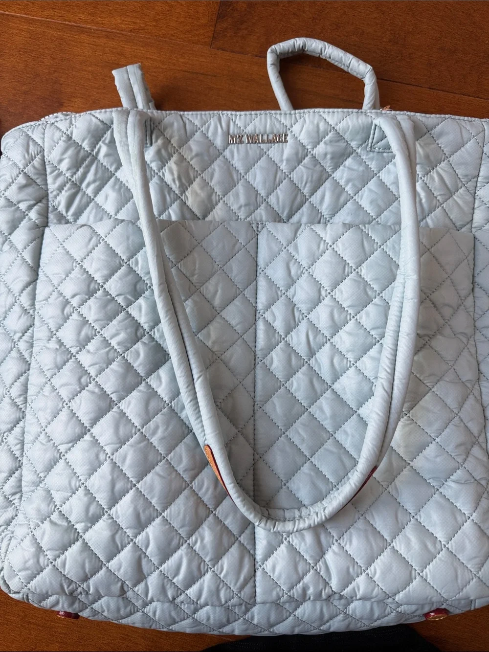 MZ Wallace bought used